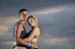 romantic urban couple dancing outdoor photo