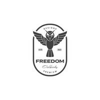 flying black owl vintage logo design vector