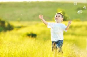 child and bubbles photo