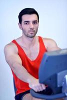 man running on the treadmill photo