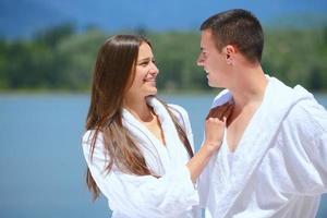 young couple on yacht photo