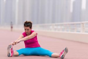 woman stretching and warming up photo