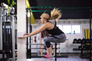 woman working out  jumping on fit box photo