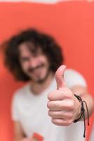 man with funny hair over color background with brush photo