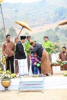 Dieng, Indonesia - August 1, 2015. Dieng Culture Festival, Tourists follow the dreadlocks procession during the Dieng Culture Festival event at Dieng, Banjarnegara district, Central Java photo