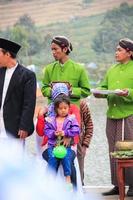 Dieng, Indonesia - August 1, 2015. Dieng Culture Festival, Tourists follow the dreadlocks procession during the Dieng Culture Festival event at Dieng, Banjarnegara district, Central Java photo