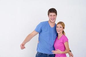 happy couple paint wall at new home photo