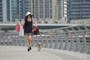 beautiful woman goes in shopping photo