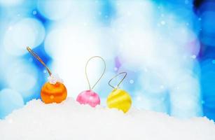 Christmas decoration on abstract background and snowflakes photo