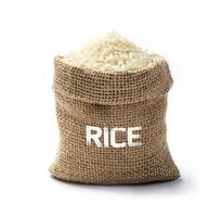 Dry rice grains in burlap photo