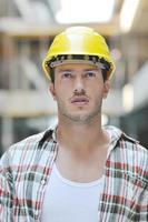 hard worker on construction site photo