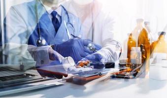 Medicine doctor and stethoscope touching icon medical network connection with modern interface on digital tablet in hospital background. Medical technology network concept photo