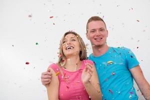 romantic young  couple celebrating  party with confetti photo