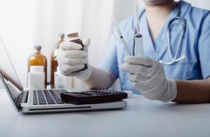 Medicine doctor and stethoscope touching icon medical network connection with modern interface on digital tablet in hospital background. Medical technology network concept photo