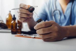 Medicine doctor and stethoscope touching icon medical network connection with modern interface on digital tablet in hospital background. Medical technology network concept photo