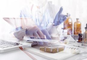 Medicine doctor and stethoscope touching icon medical network connection with modern interface on digital tablet in hospital background. Medical technology network concept photo