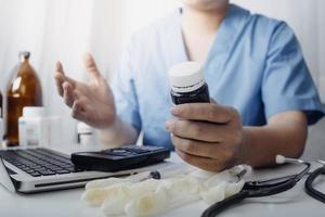 Medicine doctor and stethoscope touching icon medical network connection with modern interface on digital tablet in hospital background. Medical technology network concept photo