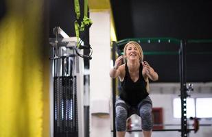 woman working out  jumping on fit box photo