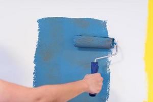 Decorator's hand painting wall photo