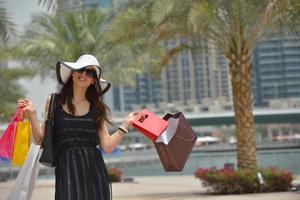 beautiful woman goes in shopping photo