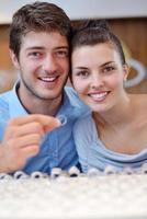 happy young couple in jewelry store photo