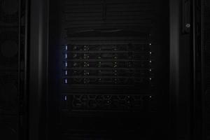 Data Center With Multiple Rows of Fully Operational Server Racks. Modern Telecommunications, Cloud Computing, Artificial Intelligence, Database, Supercomputer Technology Concept. photo