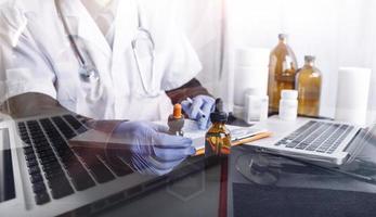 Medicine doctor and stethoscope touching icon medical network connection with modern interface on digital tablet in hospital background. Medical technology network concept photo
