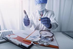 Medicine doctor and stethoscope touching icon medical network connection with modern interface on digital tablet in hospital background. Medical technology network concept photo