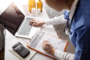 Medicine doctor and stethoscope touching icon medical network connection with modern interface on digital tablet in hospital background. Medical technology network concept photo