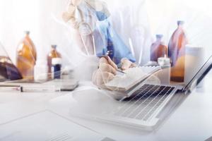Medicine doctor and stethoscope touching icon medical network connection with modern interface on digital tablet in hospital background. Medical technology network concept photo