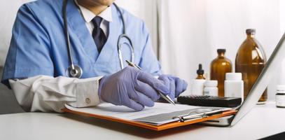 Medicine doctor and stethoscope touching icon medical network connection with modern interface on digital tablet in hospital background. Medical technology network concept photo