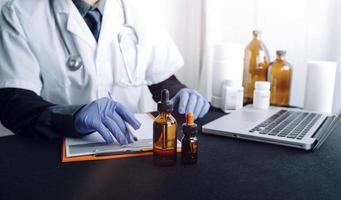Medicine doctor and stethoscope touching icon medical network connection with modern interface on digital tablet in hospital background. Medical technology network concept photo