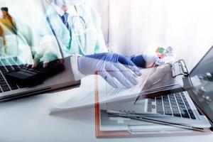 Medicine doctor and stethoscope touching icon medical network connection with modern interface on digital tablet in hospital background. Medical technology network concept photo