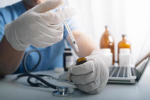 Medicine doctor and stethoscope touching icon medical network connection with modern interface on digital tablet in hospital background. Medical technology network concept photo