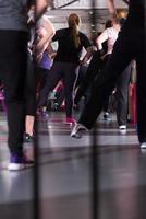 sporty women exercising with a rubber bands photo