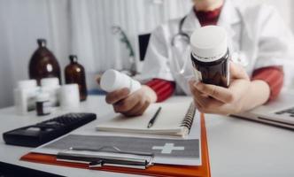 Medicine doctor and stethoscope touching icon medical network connection with modern interface on digital tablet in hospital background. Medical technology network concept photo