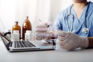 Medicine doctor and stethoscope touching icon medical network connection with modern interface on digital tablet in hospital background. Medical technology network concept photo