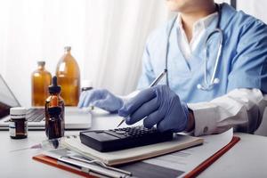Medicine doctor and stethoscope touching icon medical network connection with modern interface on digital tablet in hospital background. Medical technology network concept photo