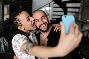 man and woman making selfie photo