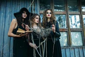 three vintage women as witches photo