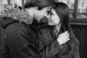 Beautiful young adult couple posing at camera photo