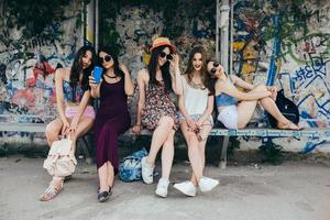 Five beautiful young girls relaxing photo