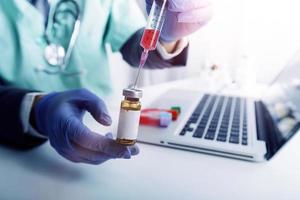 Medicine doctor and stethoscope touching icon medical network connection with modern interface on digital tablet in hospital background. Medical technology network concept photo