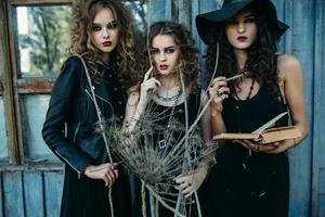 three vintage women as witches photo