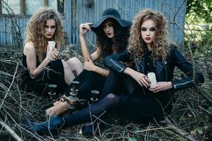 three vintage women as witches photo