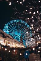 Christmas zone on Kontraktova Square with a Ferris wheel photo