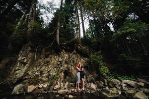 beautiful couple on the background of forest photo