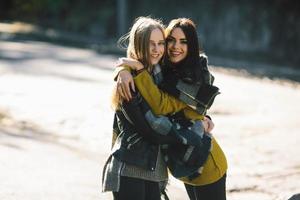 Fashion girls posing on the street photo