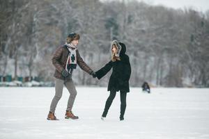 beautiful couple on a frozen lake photo