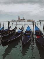 Gondolas moored by Saint Mark square photo